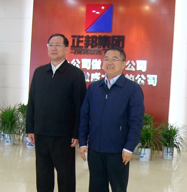 21.江西省委常委、常务副省长毛伟明与林印孙总裁亲切合影.png